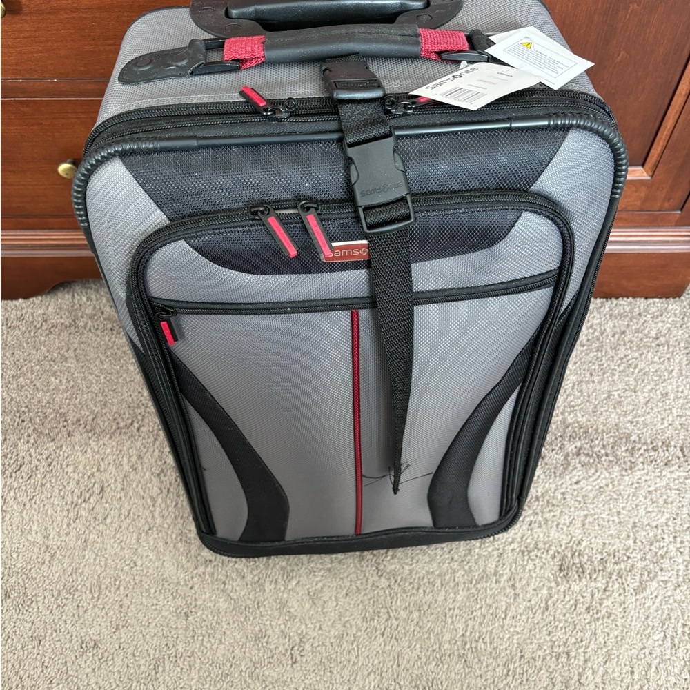Samsonite 21” Suitcase.  Two Wheel.  New with tags.  Grey/Black